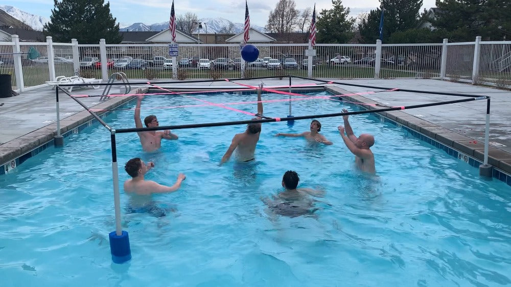 Guys playing 9 square in the pool at king henry